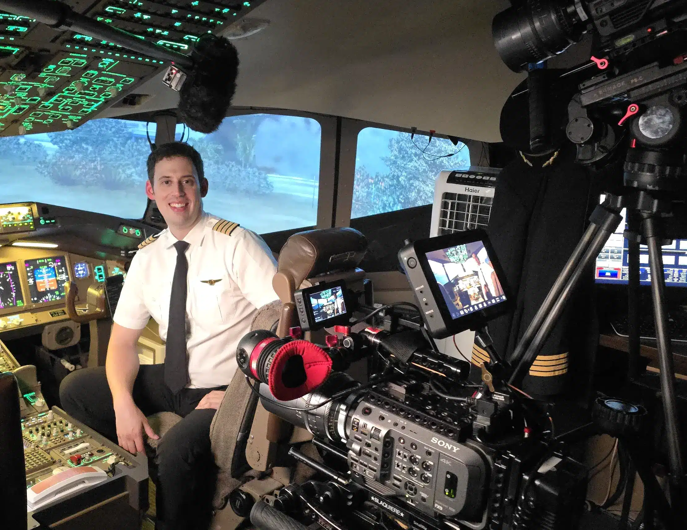 Airline captain Daniel Gustin on a documentary set as an aviation expert